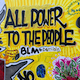 Mural that reads "All Power to the People"